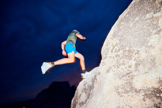 Rock climbing at sunset - Powered by Adobe