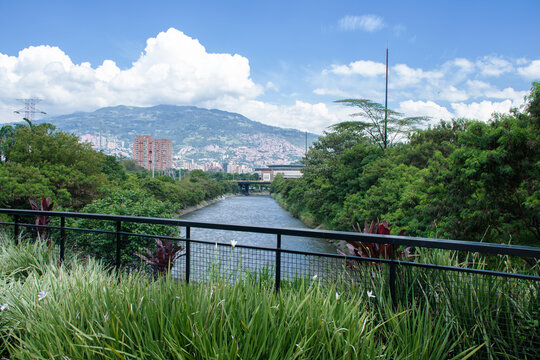 View of Medellin River Surrounded by Greenery 