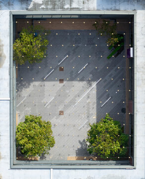 Aerial Modern Courtyard with Trees and Glass Enclosure