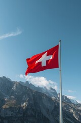 Swiss Flag Waving against Mountain Range in Switzerland