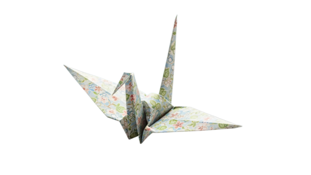 Elegant handcrafted Japanese origami crane representing hope peace and longevity isolated on transparent background