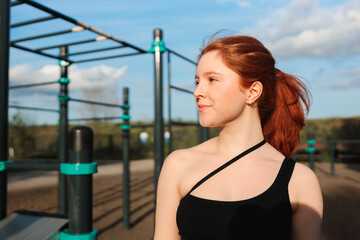 Confident Woman Standing at Outdoor Fitness Park