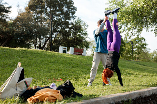 Partner-Supported Handstand Training Outdoor