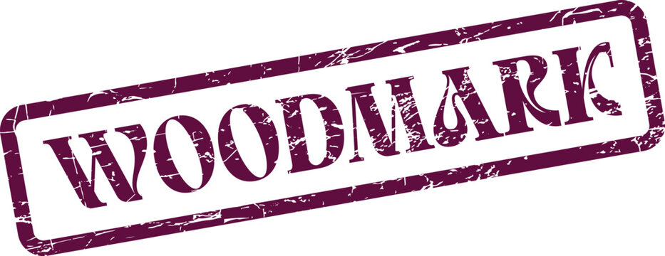 Distressed purple rubber stamp impression featuring the word WOODMARK for product authentication and branding