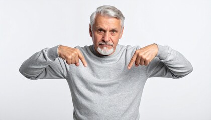 Senior Man Pointing Down with White Background.