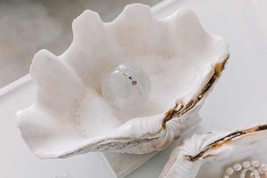 Engagement Ring in Quartz Sphere Presented in a Seashell