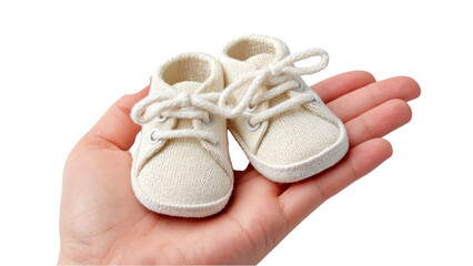Baby Shoes in Hand: Newborn, Delicate, and Tender Care Concept