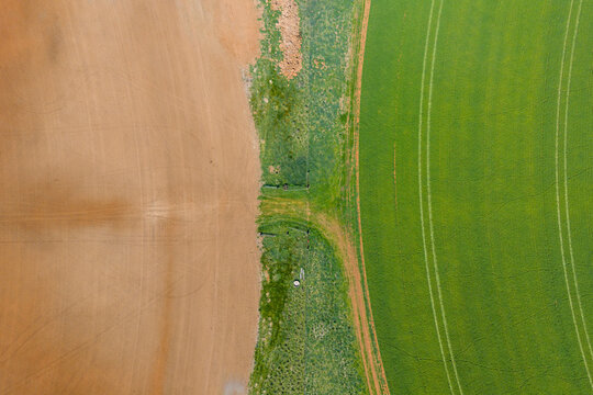 Gateway joining two circular farm fields
