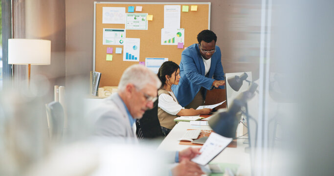 Computer, paperwork or business team with advice in office for revenue report, KPI or forecasting. Financial analyst, people or coworking with graphs for investment decision or performance monitoring