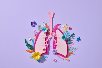 A creative paper lung design with vibrant flowers
