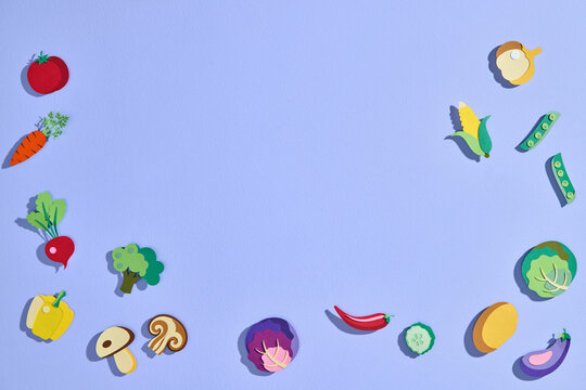Artistic arrangement of colorful paper cut-out vegetables