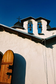Charming church bells under a clear blue sky