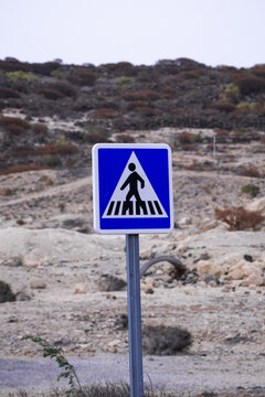 Pedestrian crossing sign.