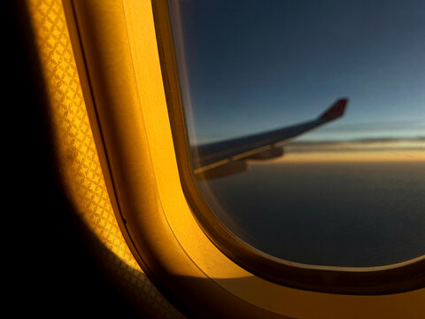 Fototapeta Sunset view from airplane window