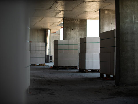 Construction blocks stacked in unfinished building