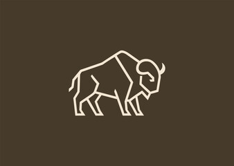 A simple geometric buffalo logo created with clean angular lines highlighting its strong horns and sturdy frame, symbolizing power, resilience, and grounded stability