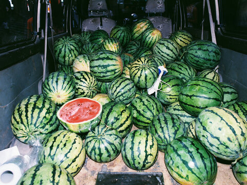 Riped watermelons in a car