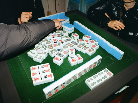 People playing Mahjong