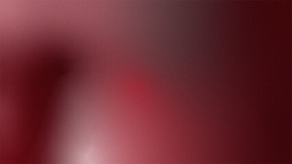 Abstract blurred background featuring shades of red and maroon with soft gradient transitions