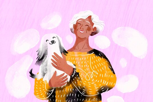 Elderly happy woman hugs her pet 