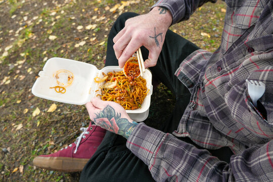  eating chinese takeout noodles 