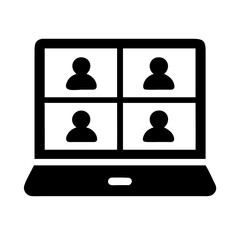 Laptop displaying a video conference call with four participants in a grid layout on the screen view image