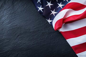 American flag draping over a black slate background texture, ideal for patriotic themes and memorial events