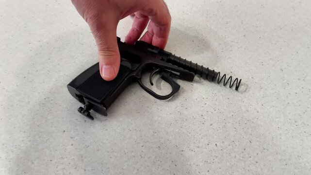 Essential guide to manual slide handling on semi automatic pistols. Clear demonstration of safe technique, grip, and motion for reliable performance