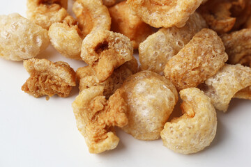 Crispy pork cracklings, a crunchy savory snack.