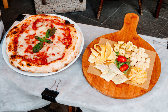 a margherita pizza and fresh pasta in Northern Italy