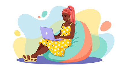 A young woman with vibrant pink hair wearing a yellow dress and sandals, comfortably sitting on a beanbag chair and working on her laptop, with a colorful abstract background