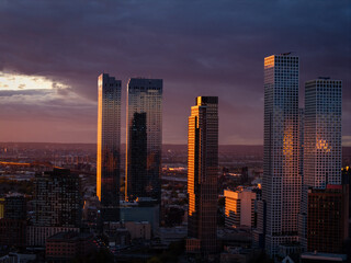 Jersey City skyscrapers reflecting sunset light
