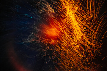 Vibrant night light trails form patterns