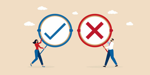 Man and woman holding check mark and cross signs representing choice