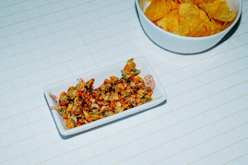 berberechos and potato chips in a spanish aperitivo