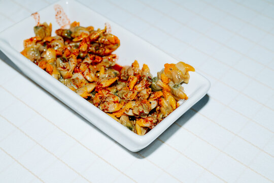spanish berberechos, marinated cockles served in a spanish aperitivo