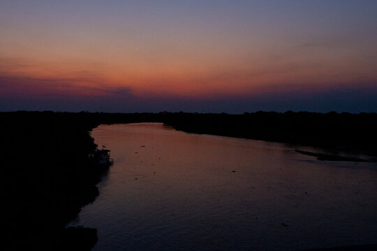 River at Dusk with Fiery Sunset
