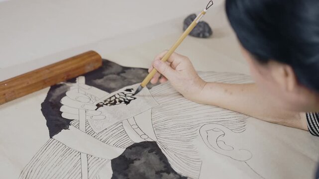 Artist Painting Ink Illustration with Brush and Traditional Technique