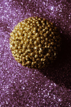 Bright Golden Decoration on Sparkling Purple Background