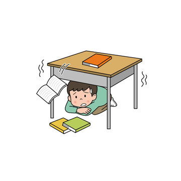 地震で机の下に身を守る子ども