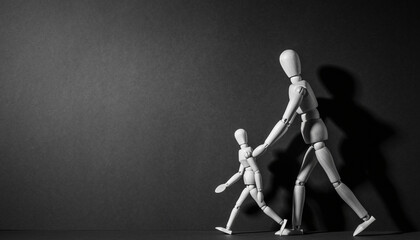 Wooden artist mannequins walking hand in hand under directional light, parent and child symbolism