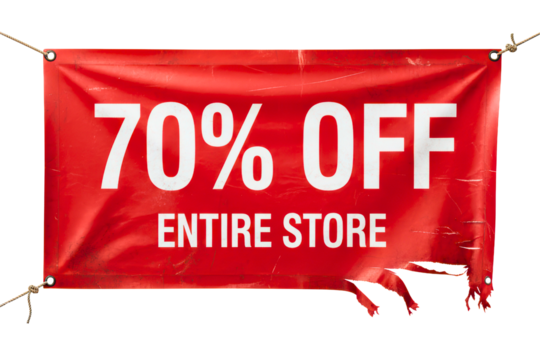Tattered red vinyl banner advertising seventy percent off store isolated on a transparent background