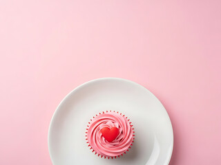 Pink cupcake with heart topper on white plate over pastel background, symbolising sweet love and romantic dessert, perfect for valentines day promotions, bakery advertising, party invitations