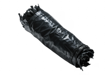Rolled black plastic garbage bags with crumpled texture isolated on a transparent background