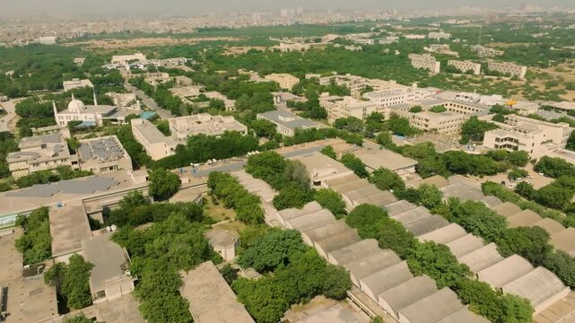 NED University campus in Karachi, Pakistan, showing various buildings and greenery from above