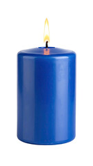 Lit blue pillar candle with flickering flame on black