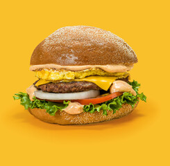 Burger with Beef Patty, Omelette Egg, Melting Cheese and Fresh Vegetables on Yellow Background — Gourmet Fast Food Advertising