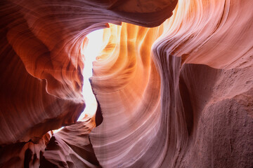 Antelope Canyon offers a breathtaking view with its vibrant rock formations and narrow passageways on Arizonas Indian reservation. The place is a mustvisit for adventure seekers. Popular place in USA.