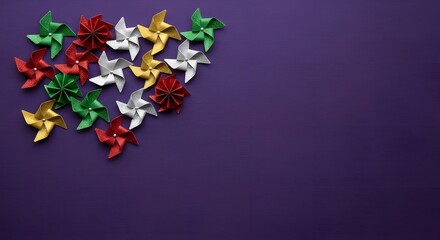 Colorful ribbon bows arranged on a purple background with copy space