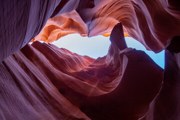 Antelope Canyon offers a breathtaking view with its vibrant rock formations and narrow passageways on Arizonas Indian reservation. The place is a mustvisit for adventure seekers. Popular place in USA.